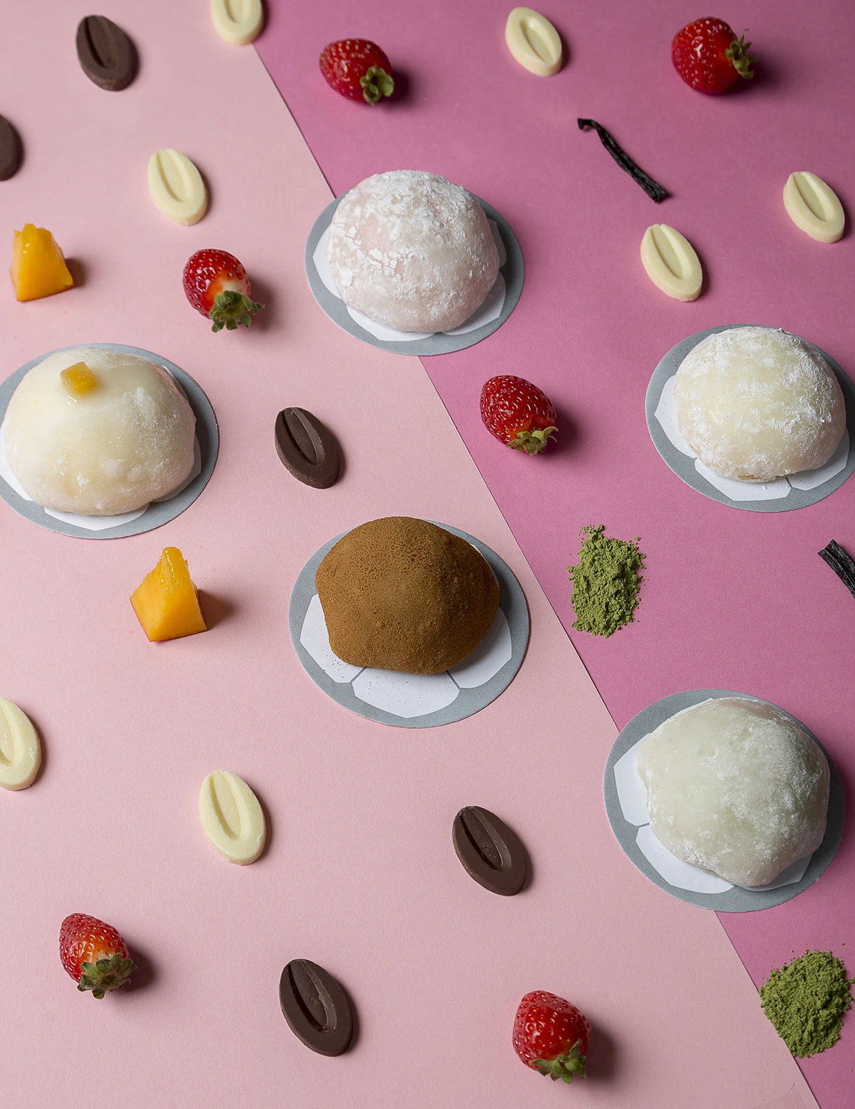 Editorial assortment of Ochiai Mochiais on a pink background with no lettering