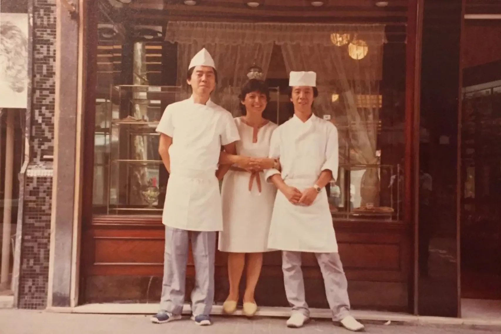Takashi Ochiai, Carme Martí and Tsuyoshi outside Ochiai pastry shop on its opening day in 1983